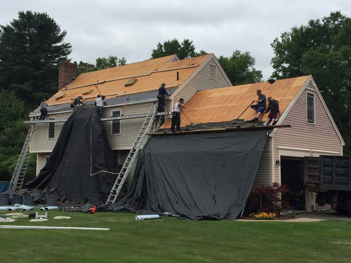 evangelous roofing company working on roof repair